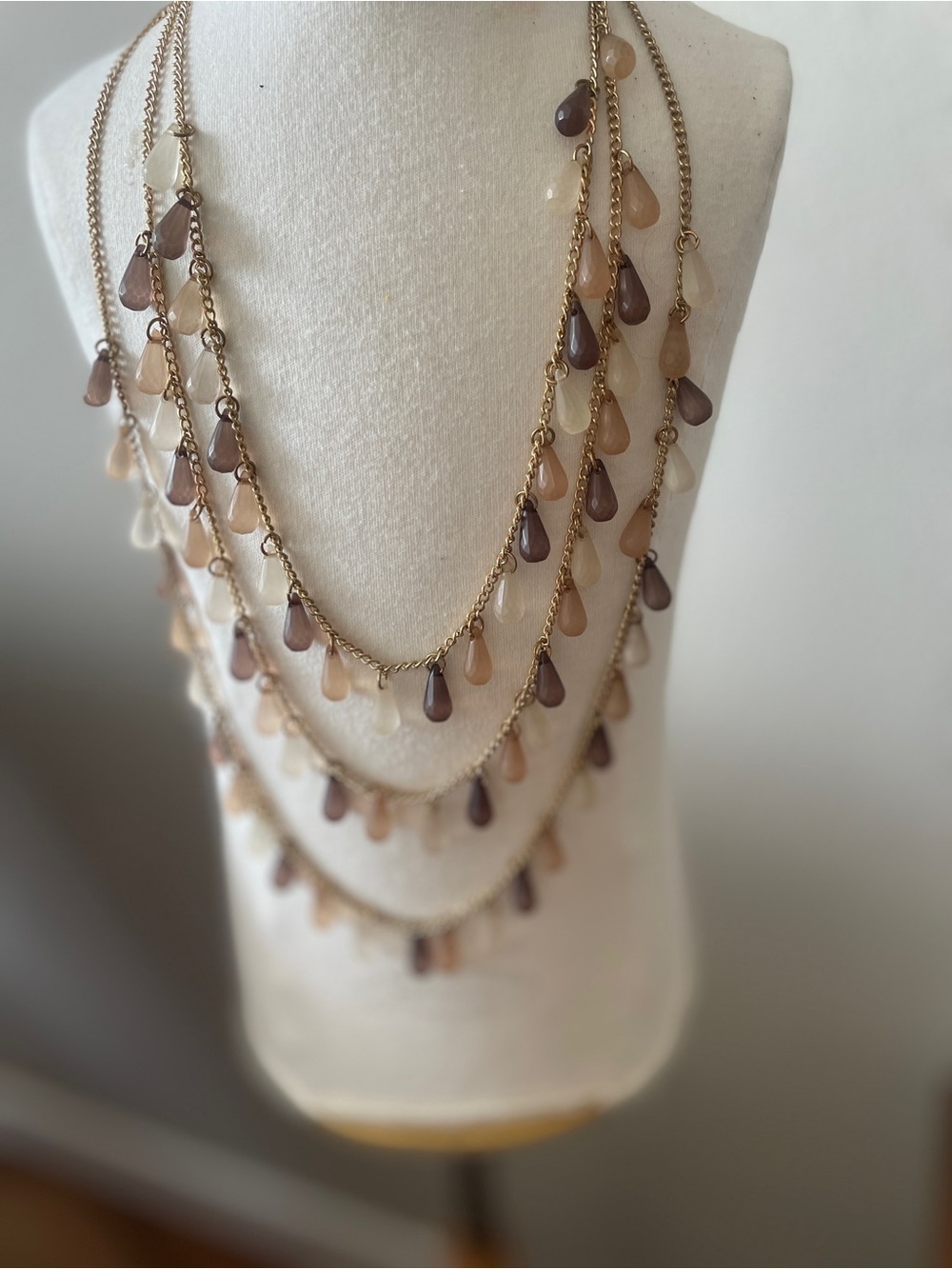 Charming Charlie Multi-Strand Teardrop Pendant Necklace in Beige & Brown Gold